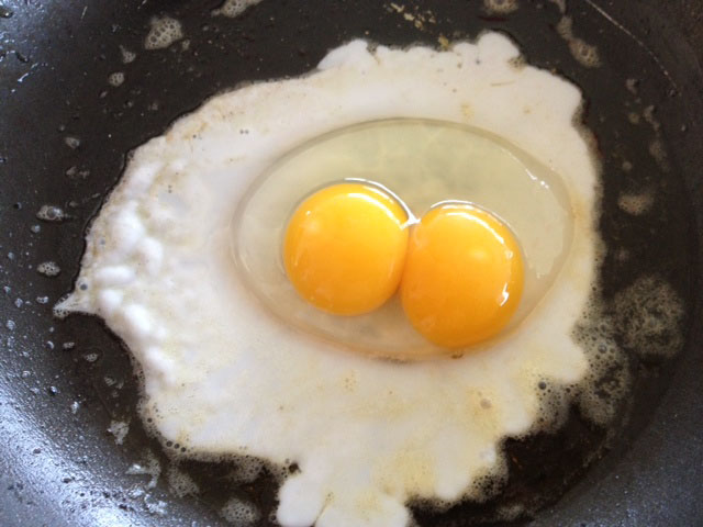 Double egg with double-yolk, fried up for breakfast.