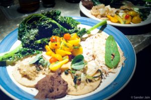 Tortillas with beans, salsa, caramelized onion, sage, steamed kale